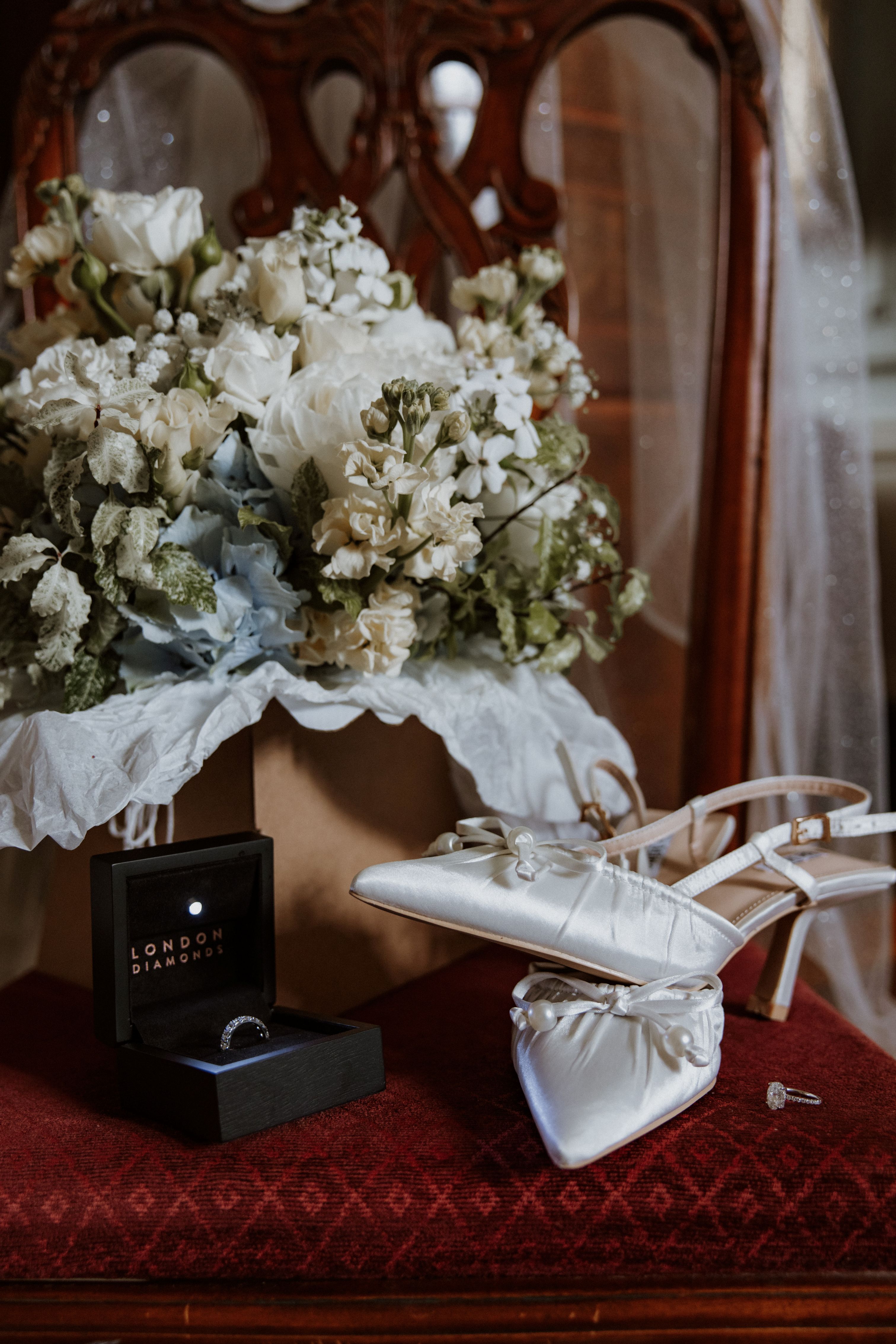 Wedding flowers, ring and shoes