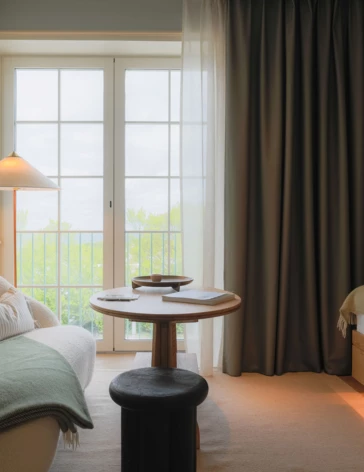 Room details window, sofa and bed