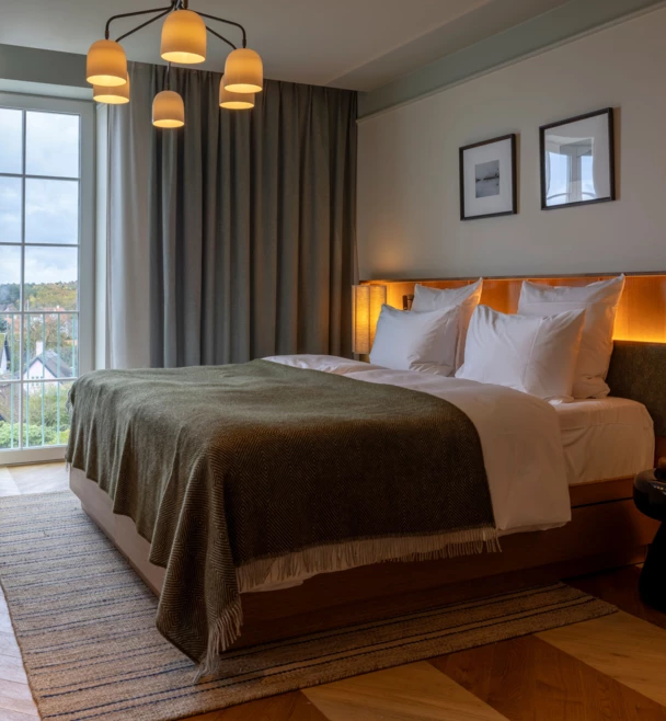 CORI Hotel Junior suite bed harbour view